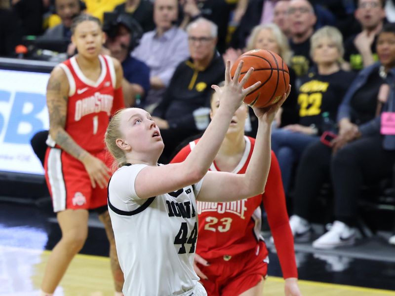 Mar 3, 2024; Iowa City, Iowa, USA; Iowa Hawkeyes forward Addison O'Grady (44) shoots against the Ohio State Buckeyes during the first half at Carver-Hawkeye Arena. Mandatory Credit: Reese Strickland-USA TODAY Sports