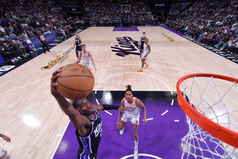 SACRAMENTO, CA - MARCH 7: Keon Ellis #23 of the Sacramento Kings dunks the ball during the game against the San Antonio Spurs on March 7, 2024 at Golden 1 Center in Sacramento, California. NOTE TO USER: User expressly acknowledges and agrees that, by downloading and or using this Photograph, user is consenting to the terms and conditions of the Getty Images License Agreement. Mandatory Copyright Notice: Copyright 2024 NBAE (Photo by Rocky Widner/NBAE via Getty Images)