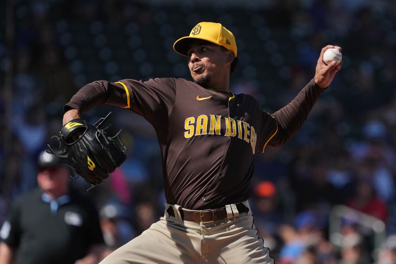 Mar 4, 2025; Mesa, Arizona, USA; San Diego Padres pitcher Miguel Cienfuegos (61) throws against the Chicago Cubs in the third inning at Sloan Park. Mandatory Credit: Rick Scuteri-Imagn Images