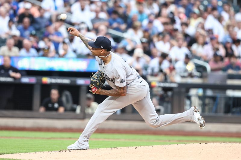 Jun 26, 2024; New York City, New York, USA;  New York Yankees starting pitcher Luis Gil (81) pitches in the first inning against the New York Mets at Citi Field. Mandatory Credit: Wendell Cruz-USA TODAY Sports