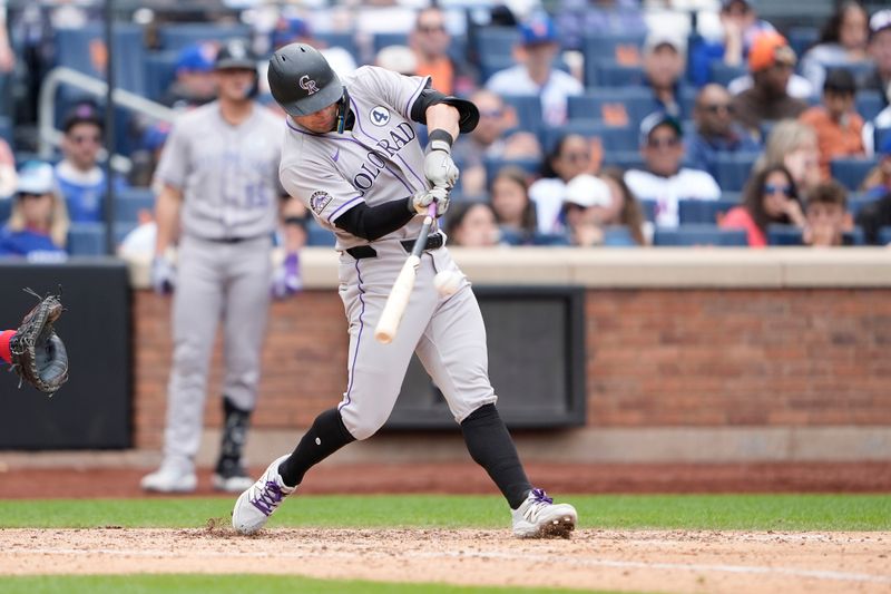Jun 1, 2025; New York City, New York, USA; Colorado Rockies right fielder Tyler Freeman (2) hits a single against the New York Mets during the eighth inning at Citi Field. Mandatory Credit: Gregory Fisher-Imagn Images