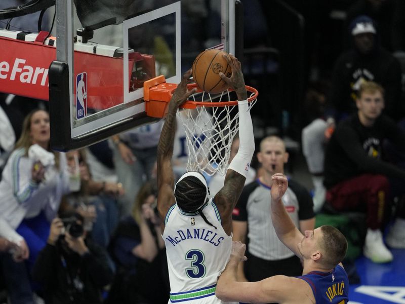 MINNEAPOLIS, MN -  MAY 16: Jaden McDaniels #3 of the Minnesota Timberwolves dunks the ball during the game against the Denver Nuggets during Round 2 Game 6 of the 2024 NBA Playoffs on May 16, 2024 at Target Center in Minneapolis, Minnesota. NOTE TO USER: User expressly acknowledges and agrees that, by downloading and or using this Photograph, user is consenting to the terms and conditions of the Getty Images License Agreement. Mandatory Copyright Notice: Copyright 2024 NBAE (Photo by Jordan Johnson/NBAE via Getty Images)