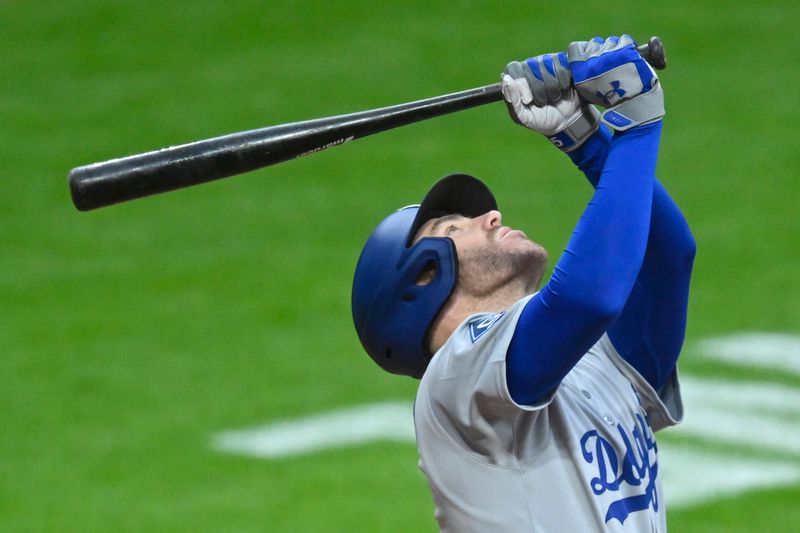 May 27, 2025; Cleveland, Ohio, USA; Los Angeles Dodgers first baseman Freddie Freeman (5) looks for the ball while fouling out in the sixth inning against the Cleveland Guardians at Progressive Field. Mandatory Credit: David Richard-Imagn Images