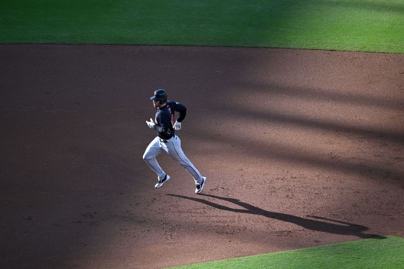 Jun 15, 2023; San Diego, California, USA; Cleveland Guardians catcher David Fry (12) rounds the bases after hitting a three-run home run against the San Diego Padres during the first inning at Petco Park. Mandatory Credit: Orlando Ramirez-USA TODAY Sports