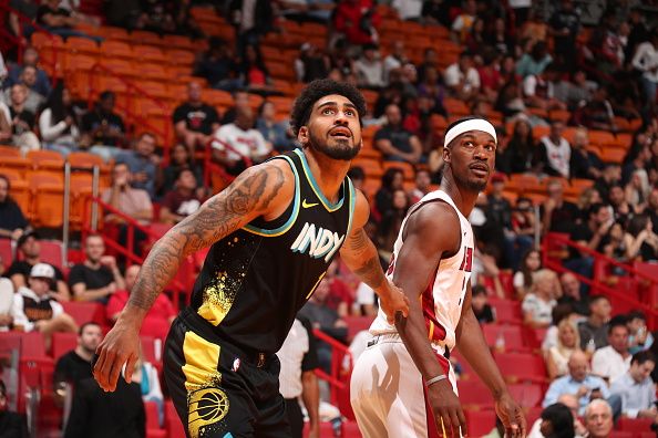 MIAMI, FL - DECEMBER 2: Obi Toppin #1 of the Indiana Pacers and Jimmy Butler #22 of the Miami Heat look on during the game on December 2, 2023 at Kaseya Center in Miami, Florida. NOTE TO USER: User expressly acknowledges and agrees that, by downloading and or using this Photograph, user is consenting to the terms and conditions of the Getty Images License Agreement. Mandatory Copyright Notice: Copyright 2023 NBAE (Photo by Issac Baldizon/NBAE via Getty Images)