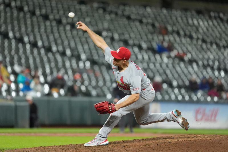 May 28, 2025; Baltimore, Maryland, USA; St. Louis Cardinals pitcher Ryan Helsley (56) delivers a pitch against the Baltimore Orioles during the ninth inning at Oriole Park at Camden Yards. Mandatory Credit: Gregory Fisher-Imagn Images