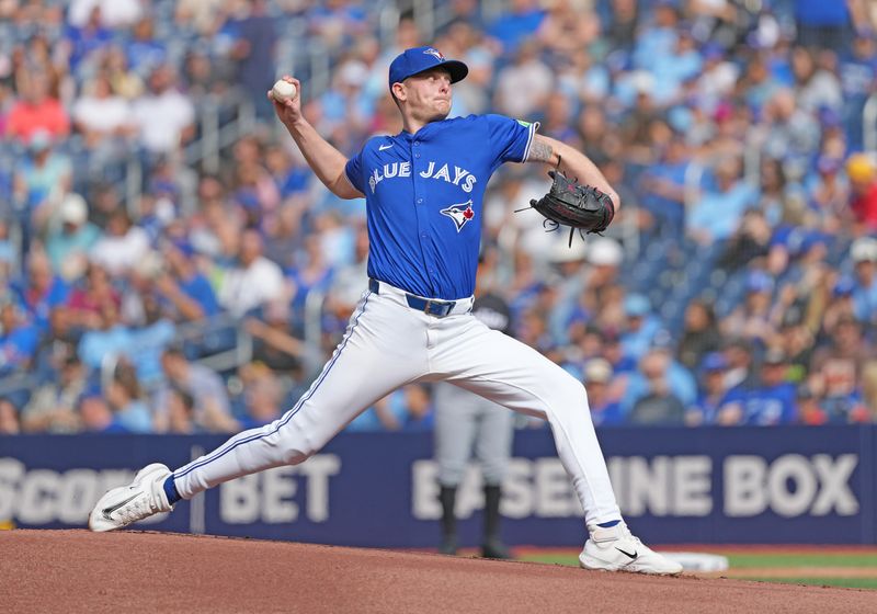 Sep 29, 2024; Toronto, Ontario, CAN; Toronto Blue Jays starting pitcher Ryan Burr (43) throws a pitch against the Miami Marlins during the first inning at Rogers Centre. Mandatory Credit: Nick Turchiaro-Imagn Images