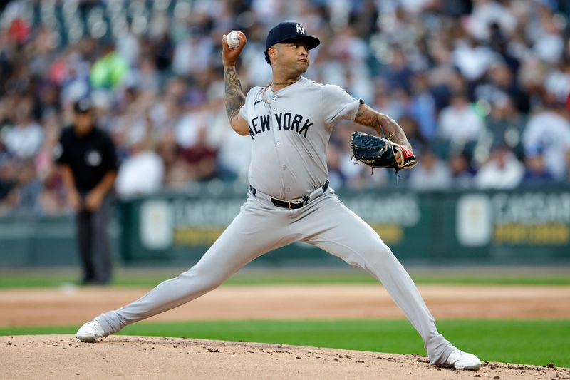 Aug 12, 2024; Chicago, Illinois, USA; New York Yankees pitcher Luis Gil (81) throws pitch against the Chicago White Sox during the first inning at Guaranteed Rate Field. Mandatory Credit: Kamil Krzaczynski-USA TODAY Sports