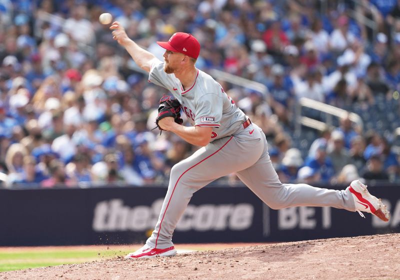 Aug 25, 2024; Toronto, Ontario, CAN; Los Angeles Angels relief pitcher Ryan Zeferjahn (56) making his MLB debut throws a pitch against the Toronto Blue Jays during the eighth inning at Rogers Centre. Mandatory Credit: Nick Turchiaro-USA TODAY Sports