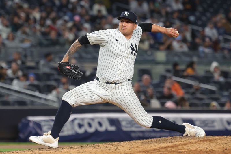 May 3, 2024; Bronx, New York, USA; New York Yankees relief pitcher Victor Gonzalez (47) delivers a pitch during the eighth inning against the Detroit Tigers at Yankee Stadium. Mandatory Credit: Vincent Carchietta-USA TODAY Sports