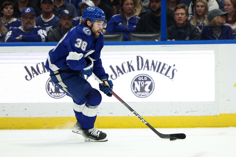 Feb 29, 2024; Tampa, Florida, USA;  Tampa Bay Lightning left wing Brandon Hagel (38) controls the puck against the Buffalo Sabres in the first period at Amalie Arena. Mandatory Credit: Nathan Ray Seebeck-USA TODAY Sports