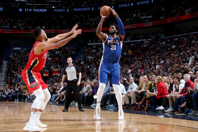 NEW ORLEANS, LA - DECEMBER 30: Joel Embiid #21 of the Philadelphia 76ers shoots a three point basket during the game against the New Orleans Pelicans on December 30, 2022 at the Smoothie King Center in New Orleans, Louisiana. NOTE TO USER: User expressly acknowledges and agrees that, by downloading and or using this Photograph, user is consenting to the terms and conditions of the Getty Images License Agreement. Mandatory Copyright Notice: Copyright 2022 NBAE (Photo by Layne Murdoch Jr./NBAE via Getty Images)