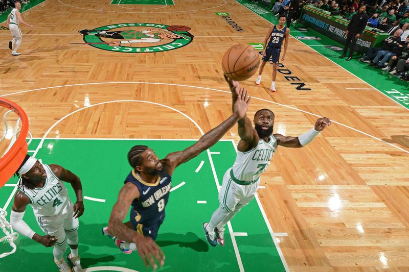 BOSTON, MA - JANUARY 29: Jaylen Brown #7 of the Boston Celtics rebounds during the game against the New Orleans Pelicans on January 29, 2024 at the TD Garden in Boston, Massachusetts. NOTE TO USER: User expressly acknowledges and agrees that, by downloading and or using this photograph, User is consenting to the terms and conditions of the Getty Images License Agreement. Mandatory Copyright Notice: Copyright 2024 NBAE  (Photo by Brian Babineau/NBAE via Getty Images)