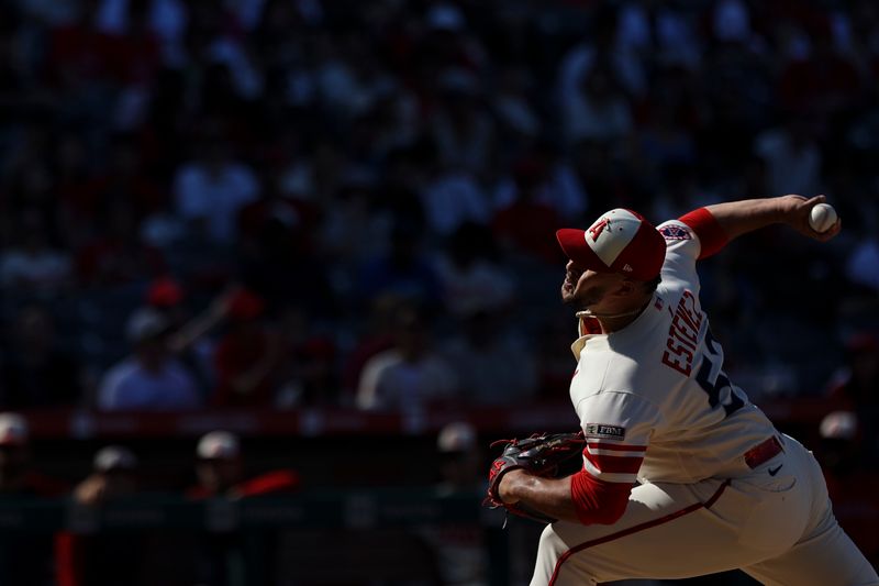 Sep 10, 2023; Anaheim, California, USA; Los Angeles Angels relief pitcher Carlos Estevez (53) throws to a Cleveland Guardians batter during the ninth inning at Angel Stadium. Mandatory Credit: Jessica Alcheh-USA TODAY Sports