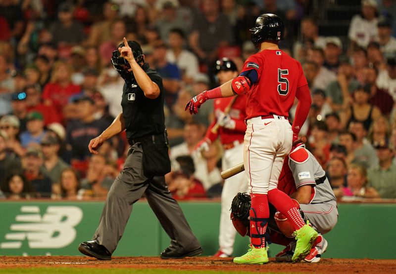 Jun 1, 2023; Boston, Massachusetts, USA; The Umpire calls a balk against Cincinnati Reds relief pitcher Kevin Herget (57) (not pictured) and advances the runners with the Boston Red Sox scoring in the eighth inning at Fenway Park. Mandatory Credit: David Butler II-USA TODAY Sports