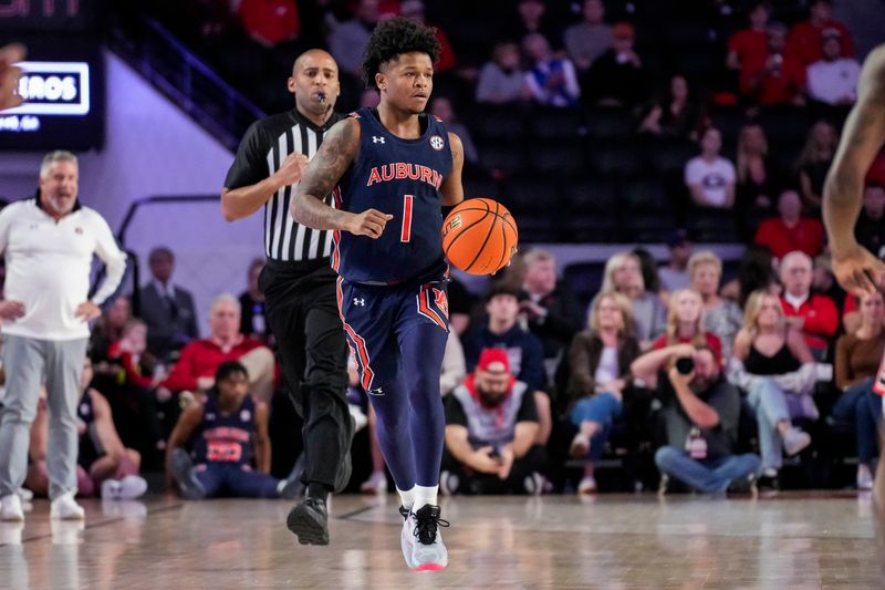 Jan 4, 2023; Athens, Georgia, USA; Auburn Tigers guard Wendell Green Jr. (1) brings the ball up the court against the Georgia Bulldogs during the first half at Stegeman Coliseum. Mandatory Credit: Dale Zanine-USA TODAY Sports