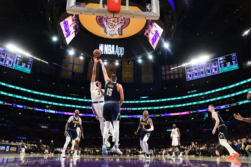 LOS ANGELES, CA - APRIL 27: Anthony Davis #3 of the Los Angeles Lakers drives to the basket during the game against the Denver Nuggets during Round 1 Game 4 of the 2024 NBA Playoffs on April 27, 2024 at Crypto.Com Arena in Los Angeles, California. NOTE TO USER: User expressly acknowledges and agrees that, by downloading and/or using this Photograph, user is consenting to the terms and conditions of the Getty Images License Agreement. Mandatory Copyright Notice: Copyright 2024 NBAE (Photo by Adam Pantozzi/NBAE via Getty Images)