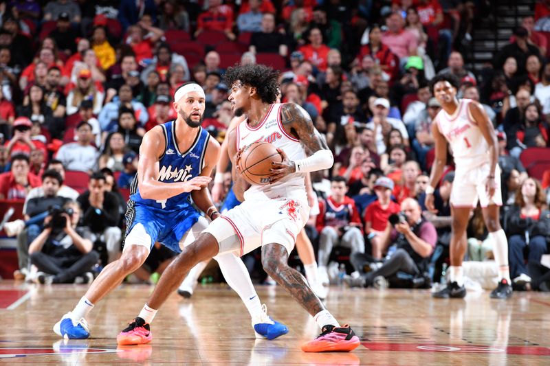 HOUSTON, TX - APRIL 9: Jalen Green #4 of the Houston Rockets handles the ball during the game against the Orlando Magic on April 9, 2024 at the Toyota Center in Houston, Texas. NOTE TO USER: User expressly acknowledges and agrees that, by downloading and or using this photograph, User is consenting to the terms and conditions of the Getty Images License Agreement. Mandatory Copyright Notice: Copyright 2024 NBAE (Photo by Logan Riely/NBAE via Getty Images)