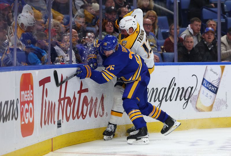 Dec 3, 2023; Buffalo, New York, USA;  Buffalo Sabres defenseman Rasmus Dahlin (26) checks Nashville Predators center Yakov Trenin (13) as he goes after a loose puck during the third period at KeyBank Center. Mandatory Credit: Timothy T. Ludwig-USA TODAY Sports