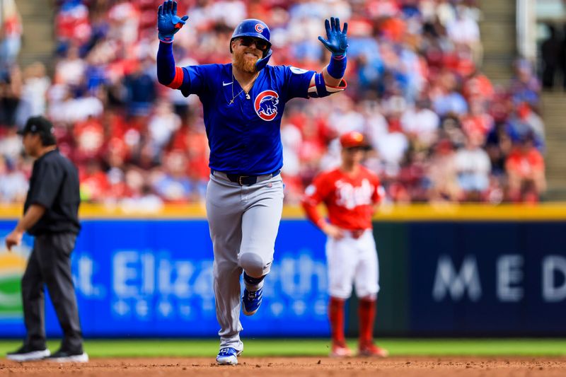 May 24, 2025; Cincinnati, Ohio, USA; Chicago Cubs first baseman Justin Turner (3) reacts after hitting a solo home run in the third inning against the Cincinnati Reds at Great American Ball Park. Mandatory Credit: Katie Stratman-Imagn Images