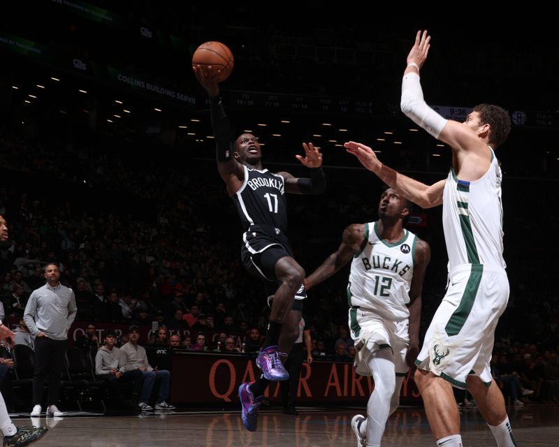 BROOKLYN, NY - DECEMBER 8: Dennis Schroder #17 of the Brooklyn Nets shoots the ball during the game against the Milwaukee Bucks on December 8, 2024 at Barclays Center in Brooklyn, New York. NOTE TO USER: User expressly acknowledges and agrees that, by downloading and or using this Photograph, user is consenting to the terms and conditions of the Getty Images License Agreement. Mandatory Copyright Notice: Copyright 2024 NBAE (Photo by Nathaniel S. Butler/NBAE via Getty Images)