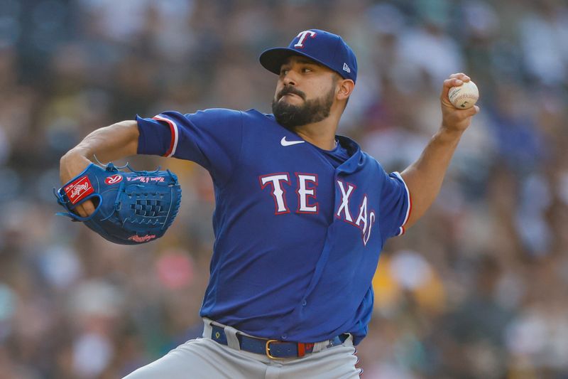 Jul 29, 2023; San Diego, California, USA;  Texas Rangers starting pitcher Martin Perez (54) throws a pitch against the San Diego Padres in the first inning at Petco Park. Mandatory Credit: David Frerker-USA TODAY Sports