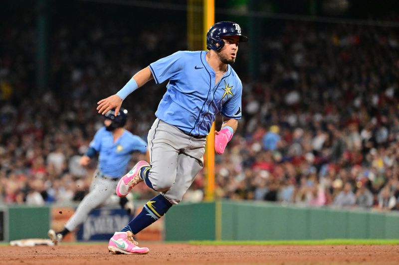 Sep 27, 2024; Boston, Massachusetts, USA; Tampa Bay Rays second baseman Jonathan Aranda (62) scores on an RBI by right fielder Josh Lowe (not pictured) during the seventh inning against the Boston Red Sox at Fenway Park. Mandatory Credit: Eric Canha-Imagn Images