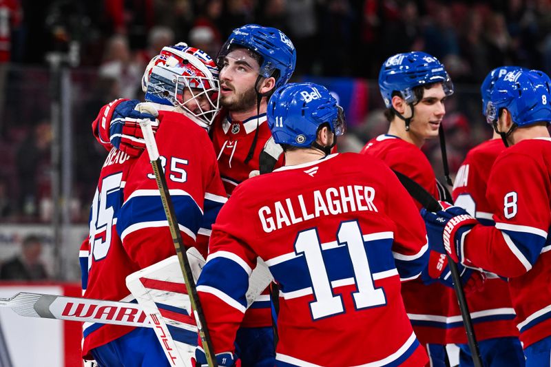 Nov 16, 2024; Montreal, Quebec, CAN; Montreal Canadiens players gather around Montreal Canadiens goalie Sam Montembeault (35) after their win against the Columbus Blue Jackets at Bell Centre. Mandatory Credit: David Kirouac-Imagn Images