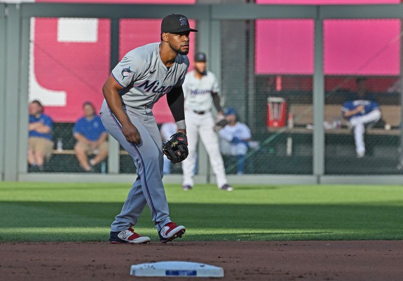 Jun 25, 2024; Kansas City, Missouri, USA; Miami Marlins second baseman Otto Lopez (61) looks on in the first inning against the Kansas City Royals at Kauffman Stadium. Mandatory Credit: Peter Aiken-USA TODAY Sports