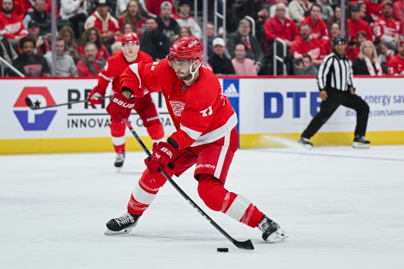 Feb 27, 2024; Detroit, Michigan, USA; Detroit Red Wings defenseman Shayne Gostisbehere (41) scores a goal during the second period against the Washington Capitals at Little Caesars Arena. Mandatory Credit: Tim Fuller-USA TODAY Sports