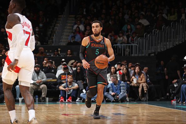 WASHINGTON, DC -? DECEMBER 27: Tyus Jones #5 of the Washington Wizards dribbles the ball during the game against the Toronto Raptors on December 27, 2023 at Capital One Arena in Washington, DC. NOTE TO USER: User expressly acknowledges and agrees that, by downloading and or using this Photograph, user is consenting to the terms and conditions of the Getty Images License Agreement. Mandatory Copyright Notice: Copyright 2023 NBAE (Photo by Stephen Gosling/NBAE via Getty Images)