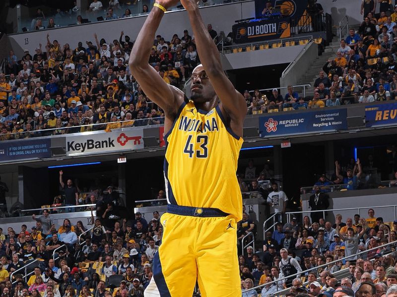 INDIANAPOLIS, IN - APRIL 28: Pascal Siakam #43 of the Indiana Pacers three point basket during the game against the Milwaukee Bucks during Round 1 Game 4 of the 2024 NBA Playoffs on April 28, 2024 at Gainbridge Fieldhouse in Indianapolis, Indiana. NOTE TO USER: User expressly acknowledges and agrees that, by downloading and or using this Photograph, user is consenting to the terms and conditions of the Getty Images License Agreement. Mandatory Copyright Notice: Copyright 2024 NBAE (Photo by Ron Hoskins/NBAE via Getty Images)