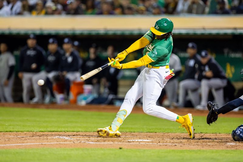 Sep 20, 2024; Oakland, California, USA; Oakland Athletics outfielder Lawrence Butler (4) singles during the fourth inning against the New York Yankees at Oakland-Alameda County Coliseum. Mandatory Credit: Bob Kupbens-Imagn Images