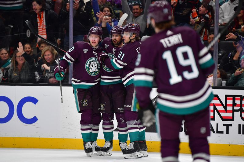 Apr 5, 2024; Anaheim, California, USA; Anaheim Ducks celebrate the goal scored by center Leo Carlsson (91) against the Seattle Kraken during the second period at Honda Center. Mandatory Credit: Gary A. Vasquez-USA TODAY Sports