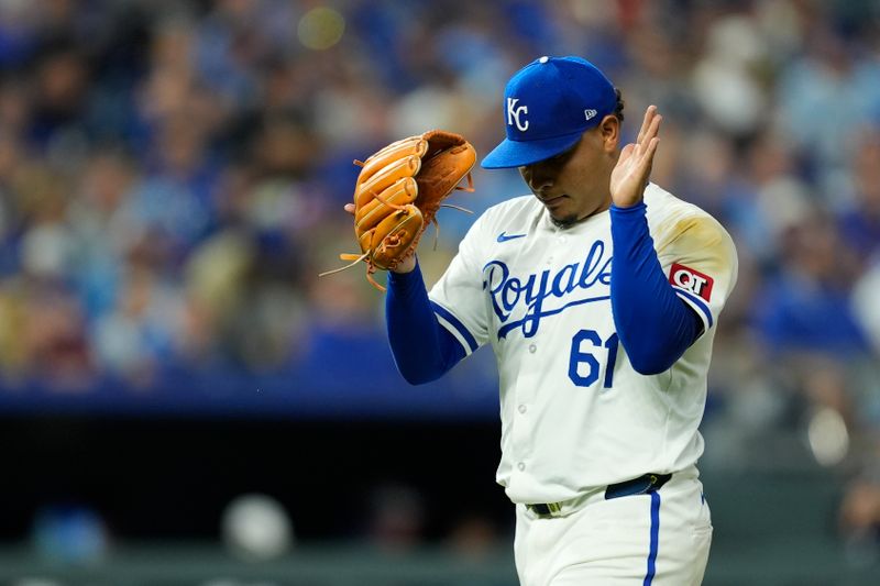 Oct 10, 2024; Kansas City, Missouri, USA; Kansas City Royals pitcher Angel Zerpa (61) walks off the field during the eighth inning against the New York Yankees during game four of the ALDS for the 2024 MLB Playoffs at Kauffman Stadium. Mandatory Credit: Jay Biggerstaff-Imagn Images
