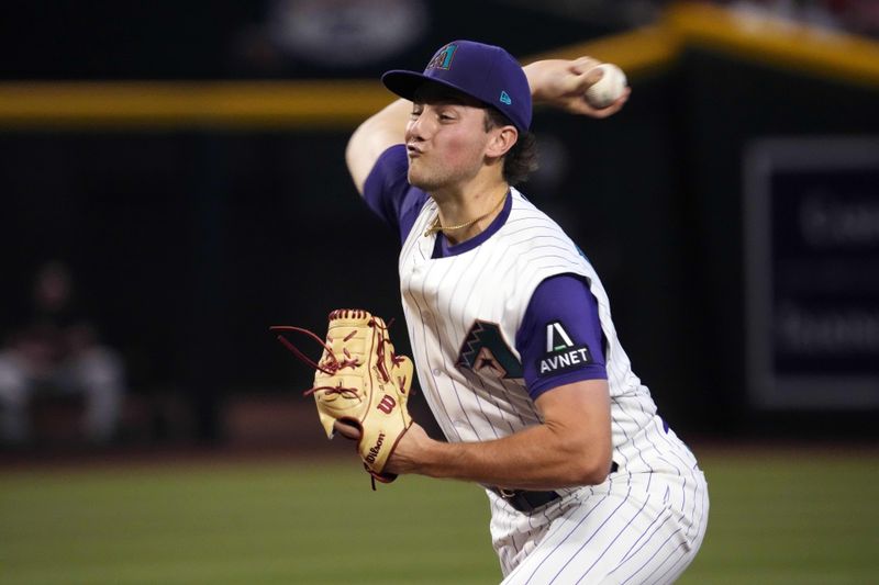 Aug 13, 2023; Phoenix, Arizona, USA; Arizona Diamondbacks starting pitcher Brandon Pfaadt (32) pitches against the San Diego Padres during the first inning at Chase Field. Mandatory Credit: Joe Camporeale-USA TODAY Sports