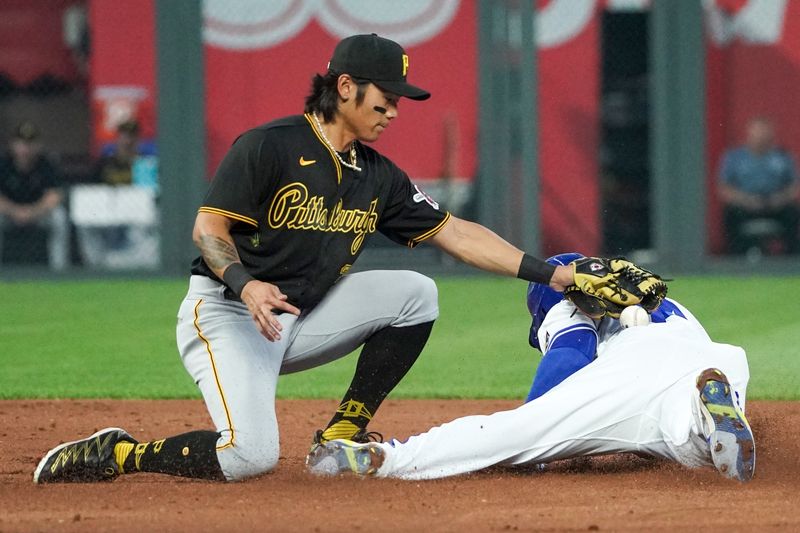 Aug 29, 2023; Kansas City, Missouri, USA; Kansas City Royals left fielder Dairon Blanco (44) steals second base as Pittsburgh Pirates second baseman Ji Hwan Bae (3) misses the tag in the third inning at Kauffman Stadium. Mandatory Credit: Denny Medley-USA TODAY Sports