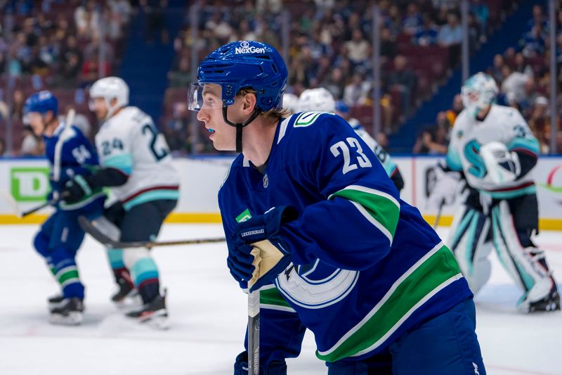 Sep 24, 2024; Vancouver, British Columbia, CAN; Vancouver Canucks forward Jonathan Lekkerimaki (23) skates against the Seattle Kraken during the first period at Rogers Arena. Mandatory Credit: Bob Frid-Imagn Images