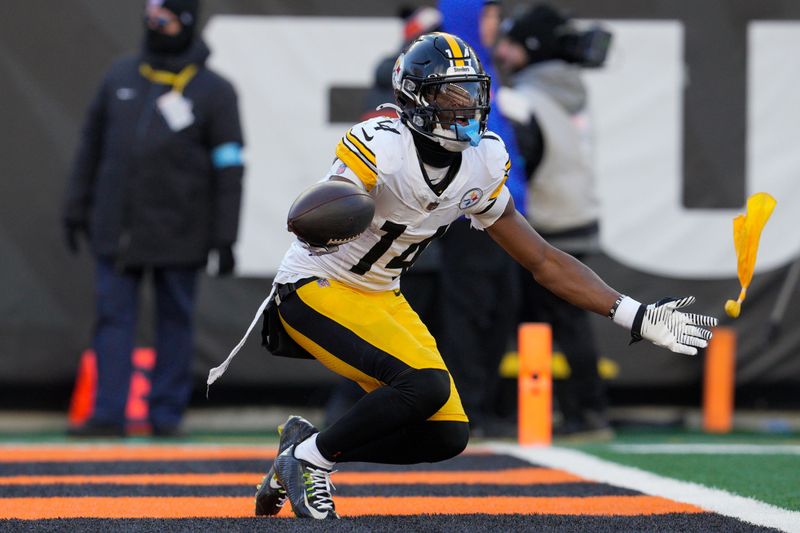 Pittsburgh Steelers wide receiver George Pickens reacts after being flagged with unsportsmanlike conduct during the second half of an NFL football game against the Cincinnati Bengals, Sunday, Dec. 1, 2024, in Cincinnati. (AP Photo/Jeff Dean)