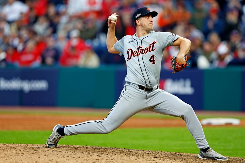 Oct 7, 2024; Cleveland, Ohio, USA; Detroit Tigers pitcher Beau Brieske (4) pitches during the ninth inning against the Cleveland Guardians during game two of the ALDS for the 2024 MLB Playoffs at Progressive Field. Mandatory Credit: Scott Glavin-Imagn Images