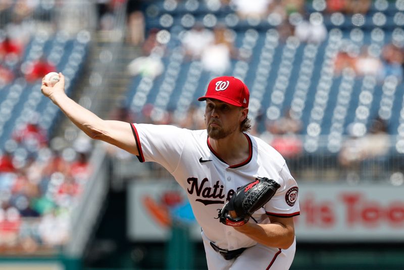 Jul 21, 2024; Washington, District of Columbia, USA; Washington Nationals starting pitcher Jake Irvin (27) pitches against the Cincinnati Reds during the second inning at Nationals Park. Mandatory Credit: Geoff Burke-USA TODAY Sports