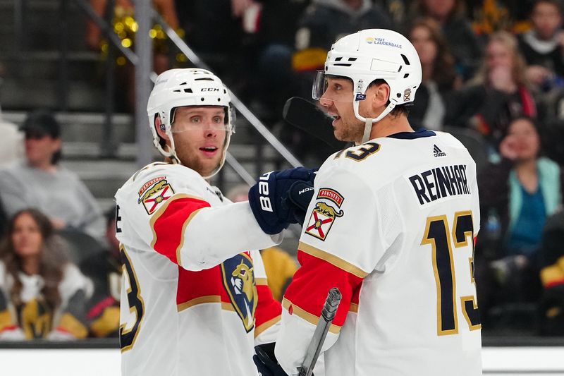 Jan 4, 2024; Las Vegas, Nevada, USA; Florida Panthers center Sam Reinhart (13) celebrates with Florida Panthers center Carter Verhaeghe (23) after scoring a goal against the Vegas Golden Knights during the third period at T-Mobile Arena. Mandatory Credit: Stephen R. Sylvanie-USA TODAY Sports