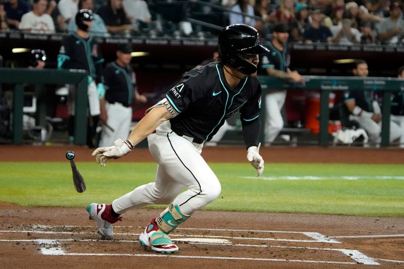 Jun 5, 2024; Phoenix, Arizona, USA; Arizona Diamondbacks outfielder Corbin Carroll (7) hits a single against the San Francisco Giants in the first inning at Chase Field. Mandatory Credit: Rick Scuteri-USA TODAY Sports