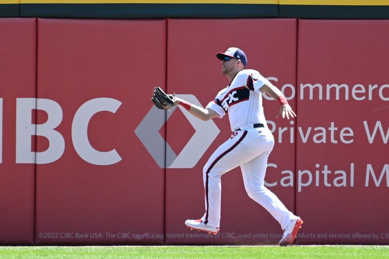 Aug 27, 2023; Chicago, Illinois, USA;  Chicago White Sox right fielder Gavin Sheets (32) catches a fly ball hit by Oakland Athletics first baseman Ryan Noda (49) during the first inning at Guaranteed Rate Field. Mandatory Credit: Matt Marton-USA TODAY Sports