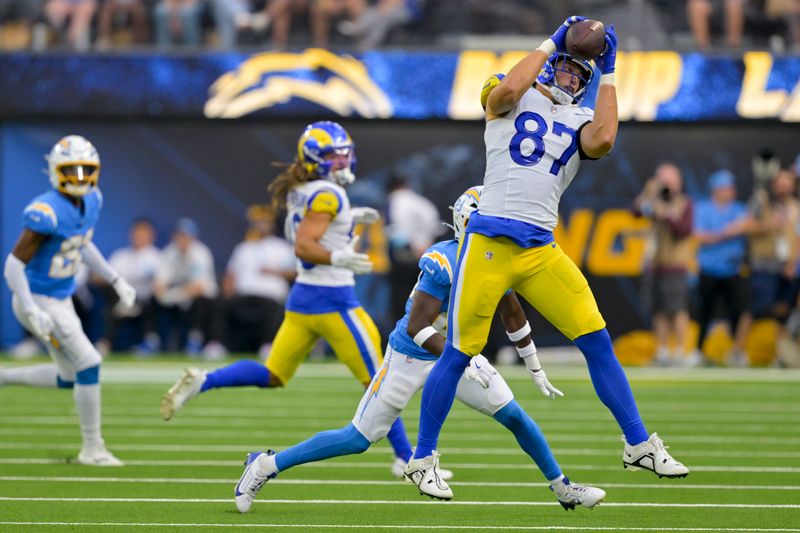 Los Angeles Rams tight end Davis Allen (87) makes a catch during the first half of a preseason NFL football game against the Los Angeles Chargers, Saturday, Aug. 17, 2024, in Inglewood, Calif. (AP Photo/Jayne Kamin-Oncea)