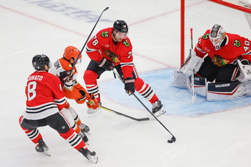 Nov 19, 2024; Chicago, Illinois, USA; Chicago Blackhawks defenseman TJ Brodie (78) defends against the Anaheim Ducks during the first period at United Center. Mandatory Credit: Kamil Krzaczynski-Imagn Images