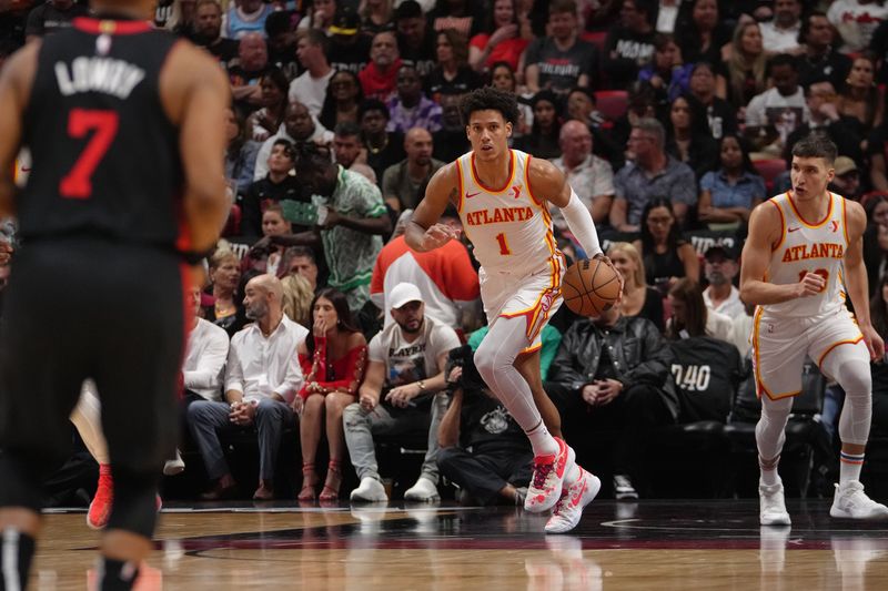MIAMI, FL - JANUARY 19: Jalen Johnson #1 of the Atlanta Hawks dribbles the ball during the game against the Miami Heat on January 19, 2024 at Kaseya Center in Miami, Florida. NOTE TO USER: User expressly acknowledges and agrees that, by downloading and or using this Photograph, user is consenting to the terms and conditions of the Getty Images License Agreement. Mandatory Copyright Notice: Copyright 2024 NBAE (Photo by Eric Espada/NBAE via Getty Images)