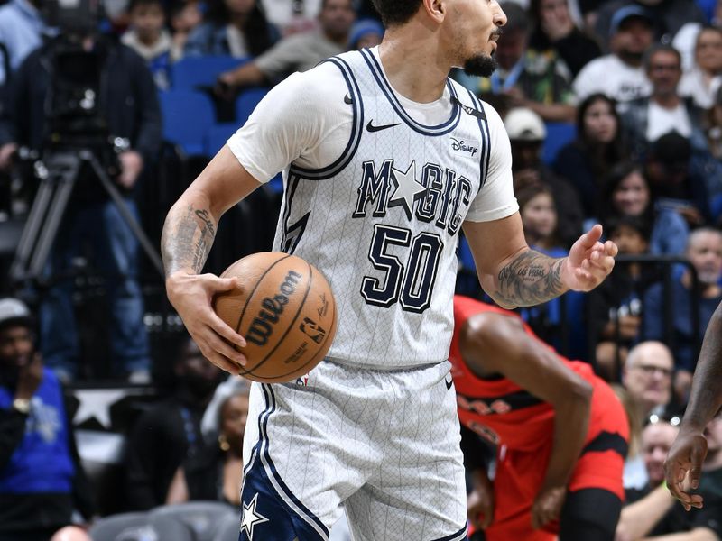 ORLANDO, FL - MARCH 2: Cole Anthony #50 of the Orlando Magic dribbles the ball during the game against the Toronto Raptors on March 2, 2025 at Kia Center in Orlando, Florida. NOTE TO USER: User expressly acknowledges and agrees that, by downloading and or using this photograph, User is consenting to the terms and conditions of the Getty Images License Agreement. Mandatory Copyright Notice: Copyright 2025 NBAE (Photo by Fernando Medina/NBAE via Getty Images)
