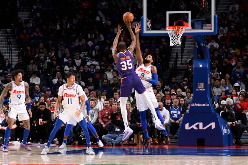 PHILADELPHIA, PA - JANUARY 6: Kevin Durant #35 of the Phoenix Suns shoots the ball during the game against the Philadelphia 76ers on January 6, 2025 at the Wells Fargo Center in Philadelphia, Pennsylvania NOTE TO USER: User expressly acknowledges and agrees that, by downloading and/or using this Photograph, user is consenting to the terms and conditions of the Getty Images License Agreement. Mandatory Copyright Notice: Copyright 2025 NBAE (Photo by David Dow/NBAE via Getty Images)