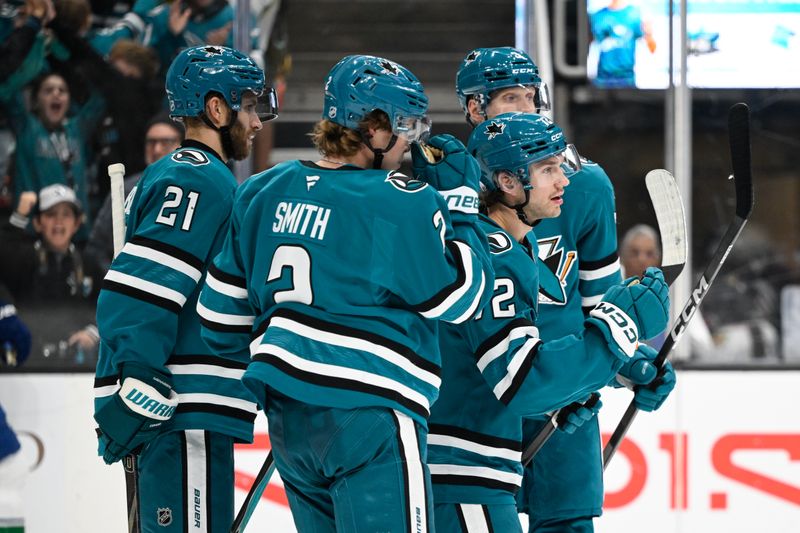 Nov 28, 2025; San Jose, California, USA; San Jose Sharks left winger William Eklund (72) celebrates their goal with teammates against the Vancouver Canucks in the second period at SAP Center at San Jose. Mandatory Credit: Eakin Howard-Imagn Images